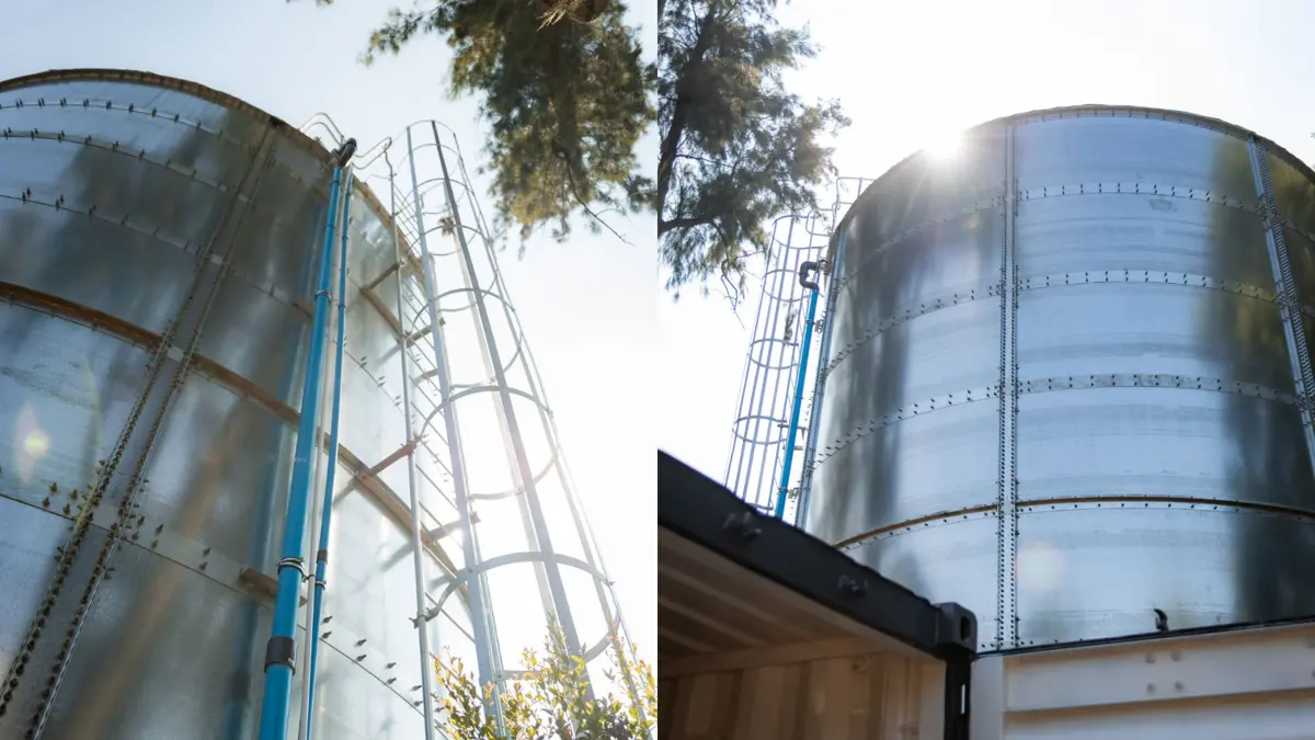 Modular galvanised steel water tank installed at a Johannesburg construction site providing water storage for sanitation and site works ahead of permanent connection
