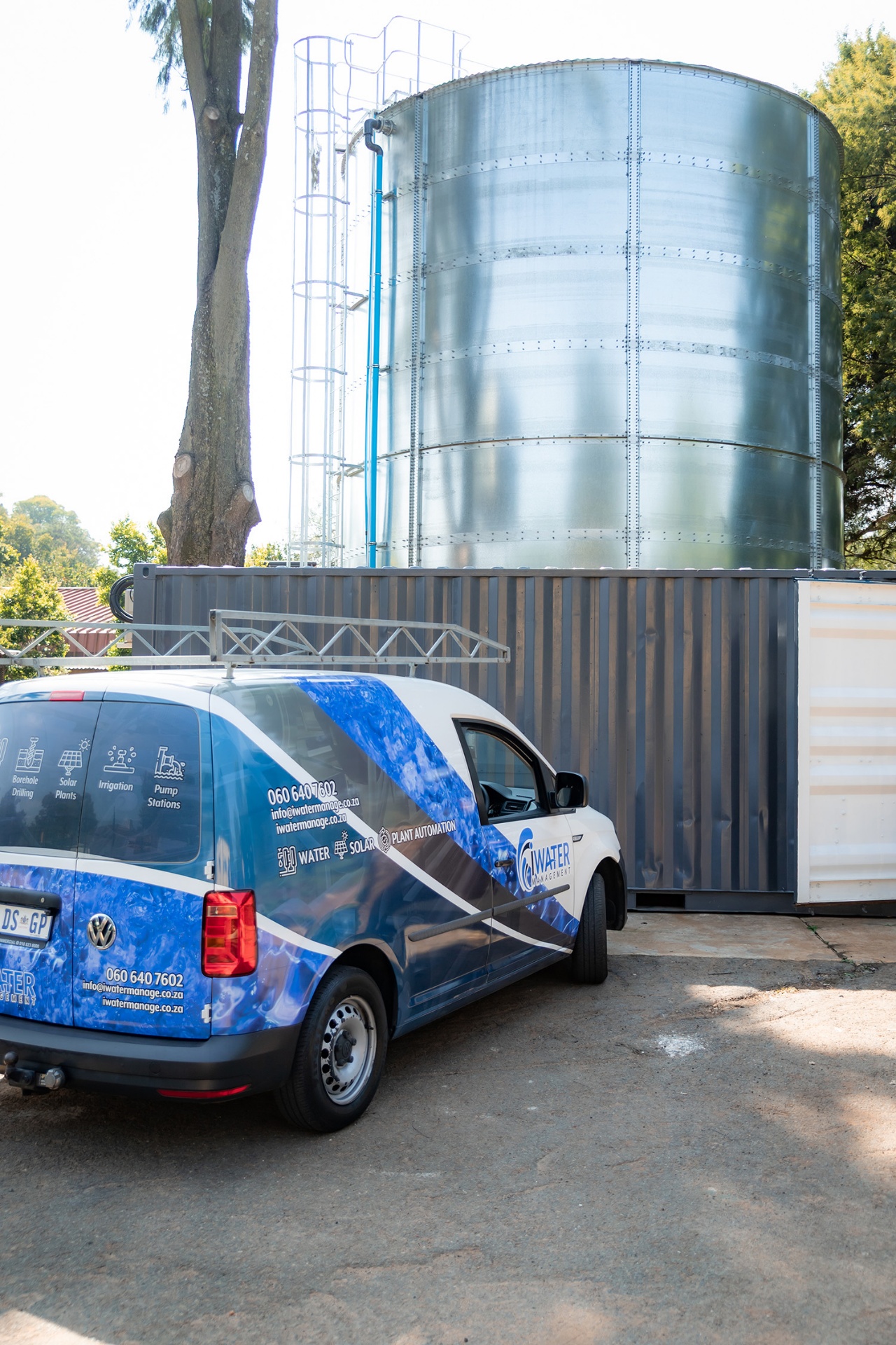 Branded van with tank at HQ