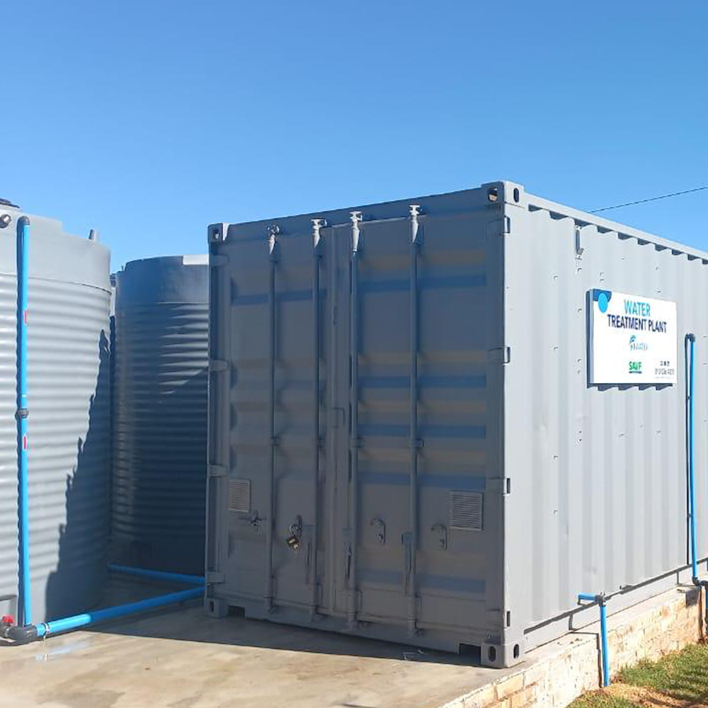 Containerized treatment system 11