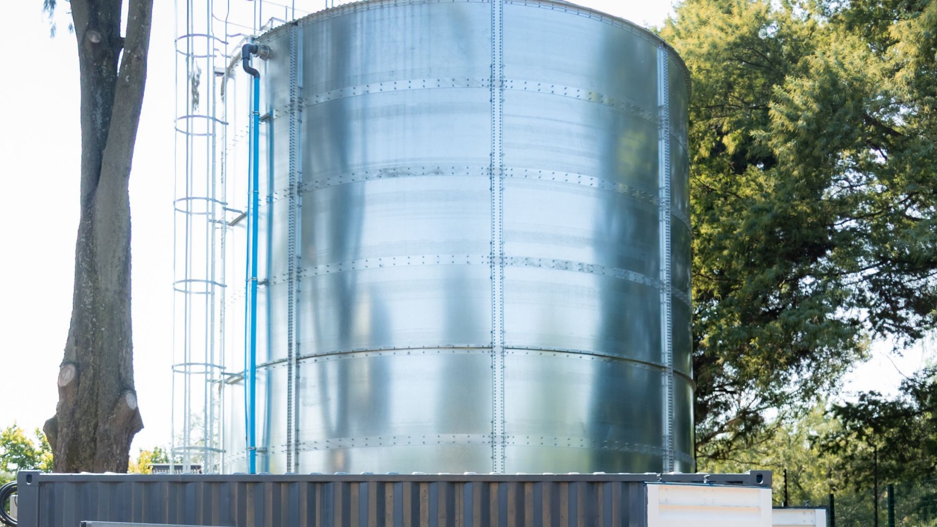 Galvanised modular steel water storage tank at an industrial facility in South Africa.