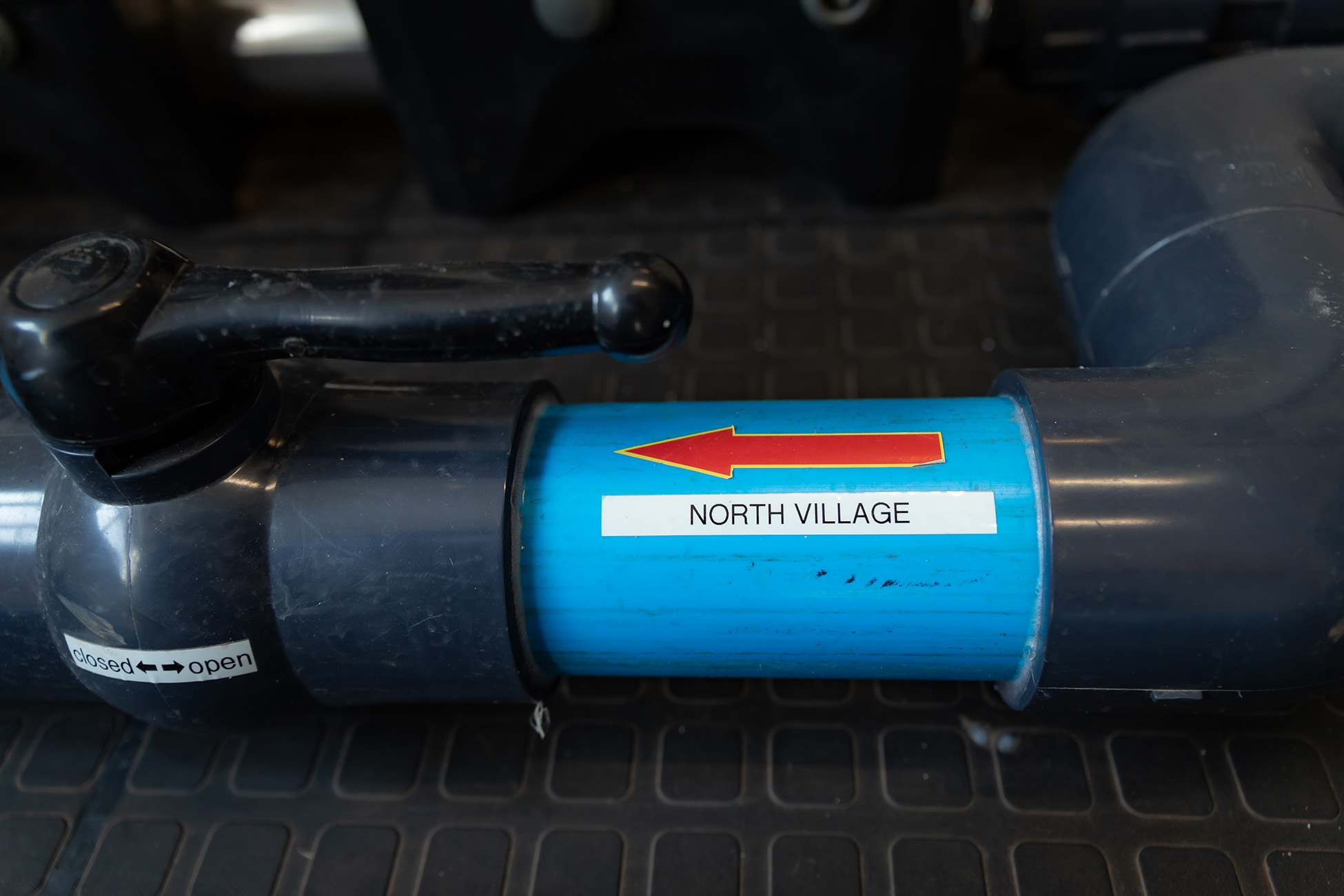 North Village pipe label