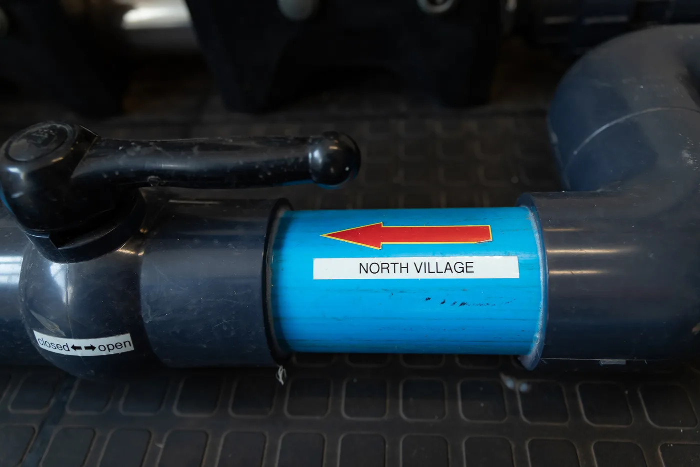 North Village pipe label