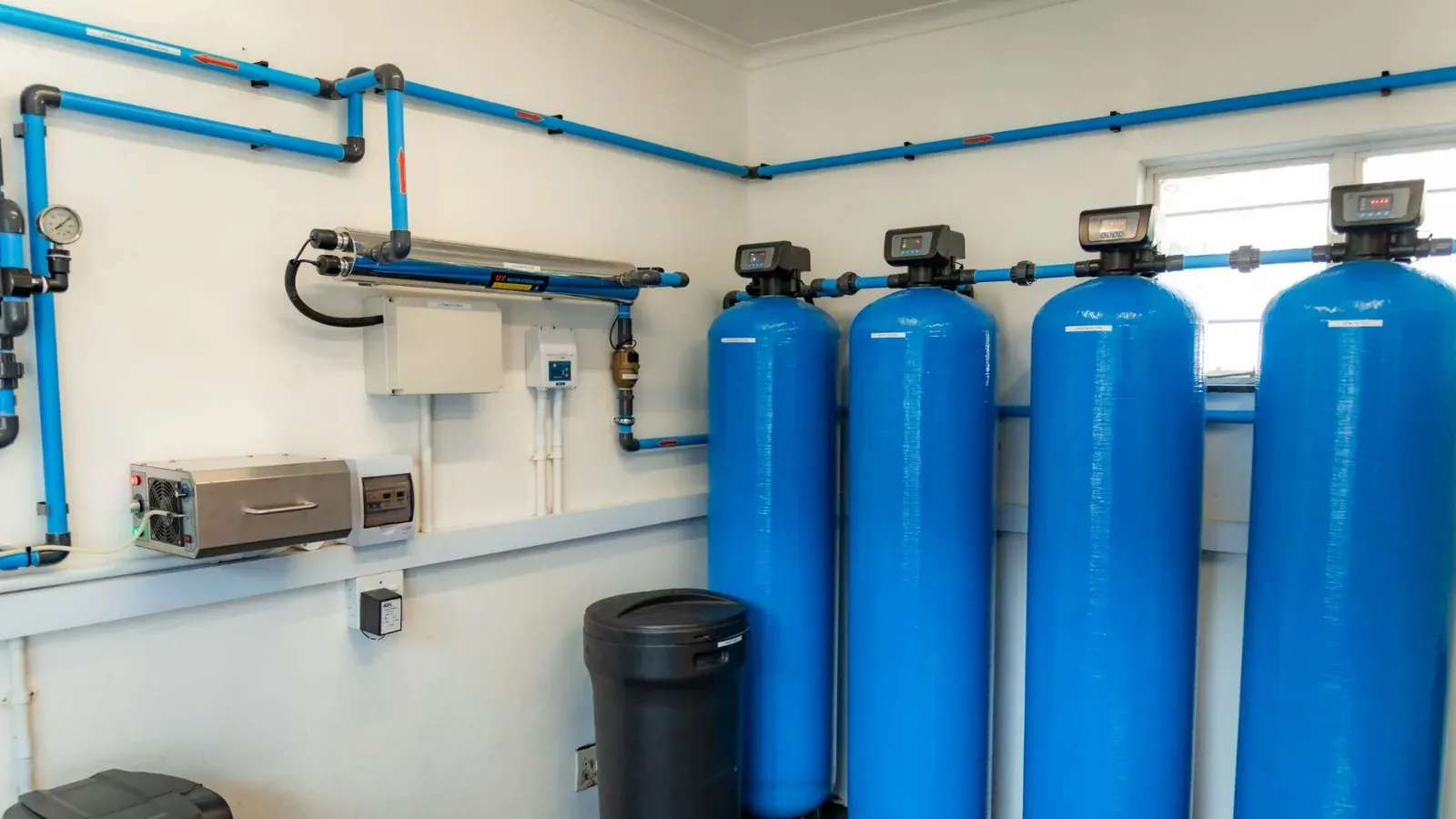 UV treatment room with water purification equipment at a South African water treatment facility.
