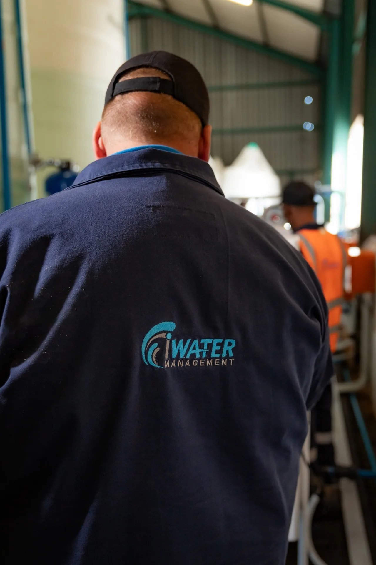 Owner in branded jacket