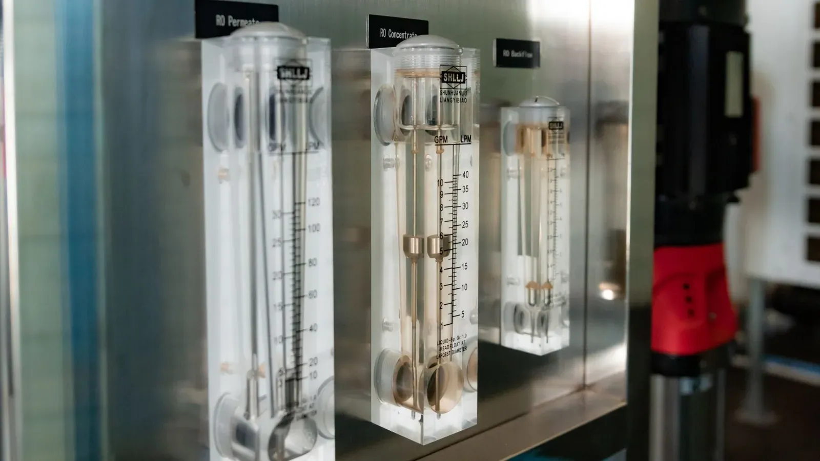 Industrial reverse osmosis flow meters at a South African water treatment facility.