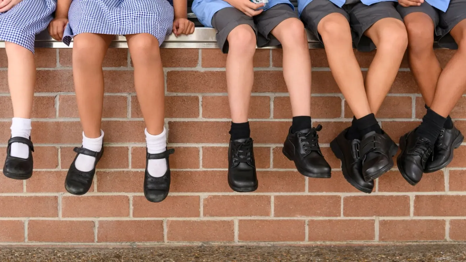 South African school learners at a water point on school grounds