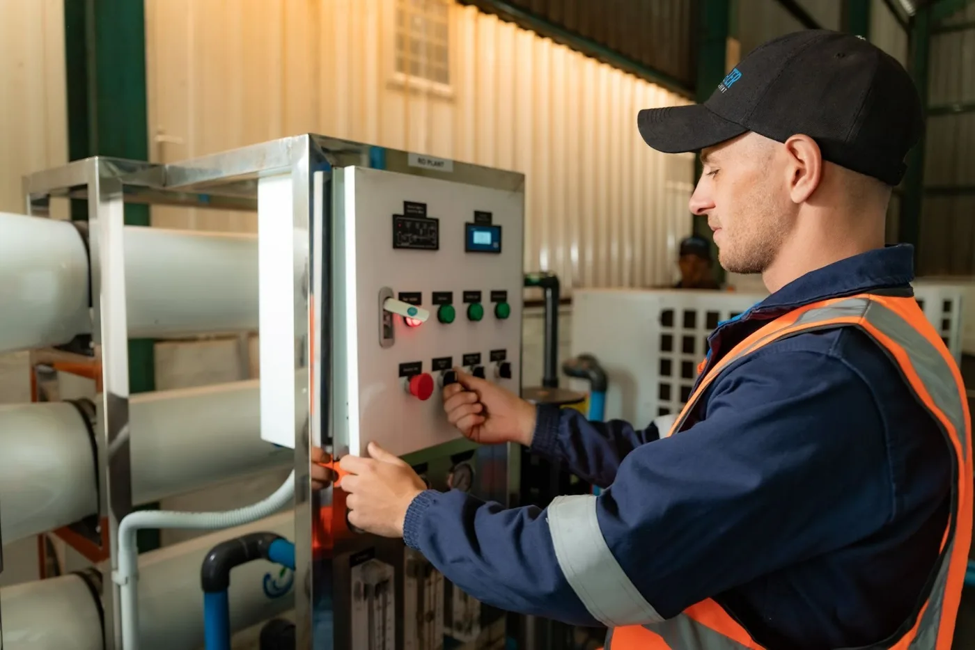 Technician at control panel