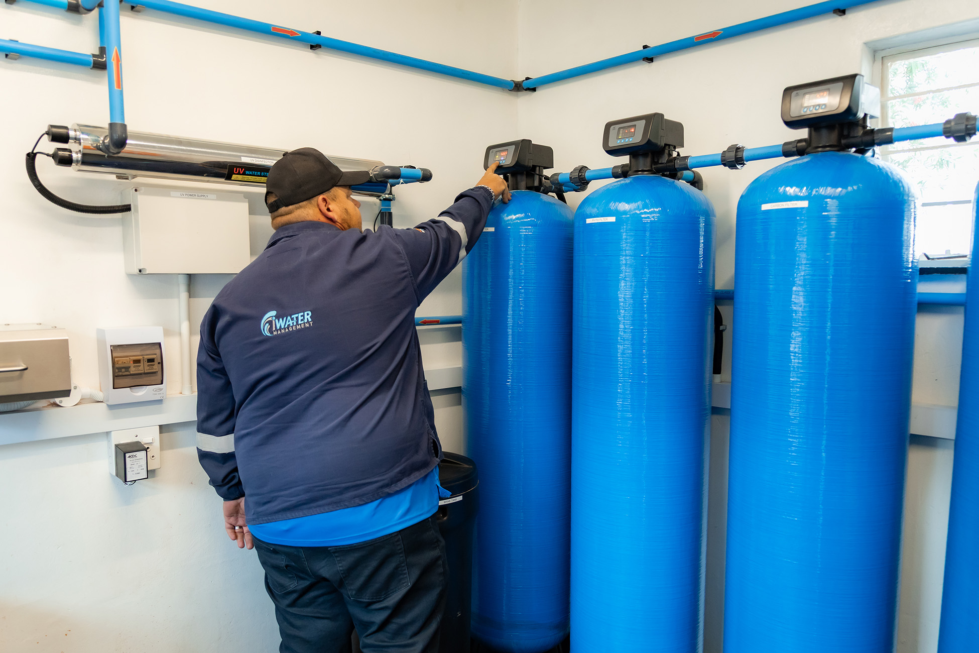 Technician at filtration tanks